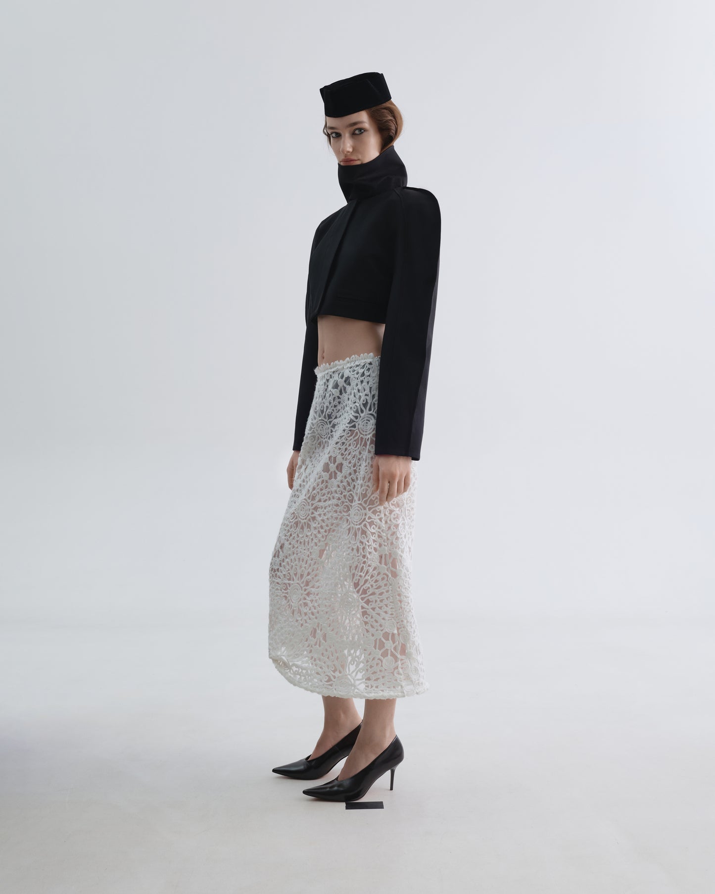Twisted Skirt with Knitted Appliqués