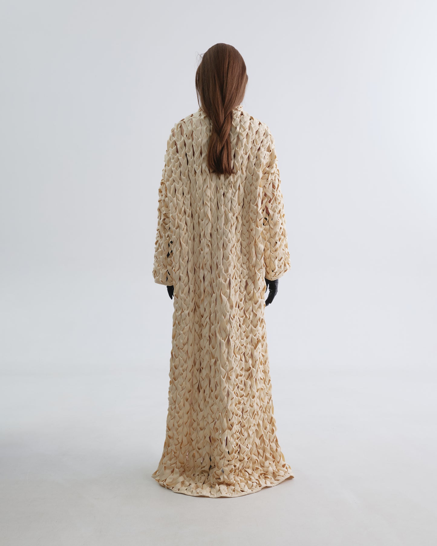 Exclusive Manually Braided Coat with Turtleneck