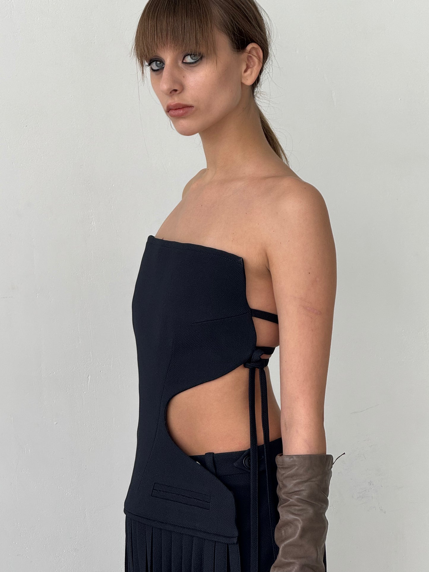 Long blue Apron with Curly Waist Cutouts