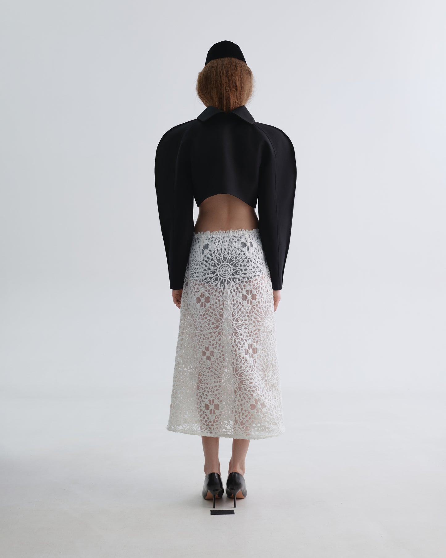 Twisted Skirt with Knitted Appliqués