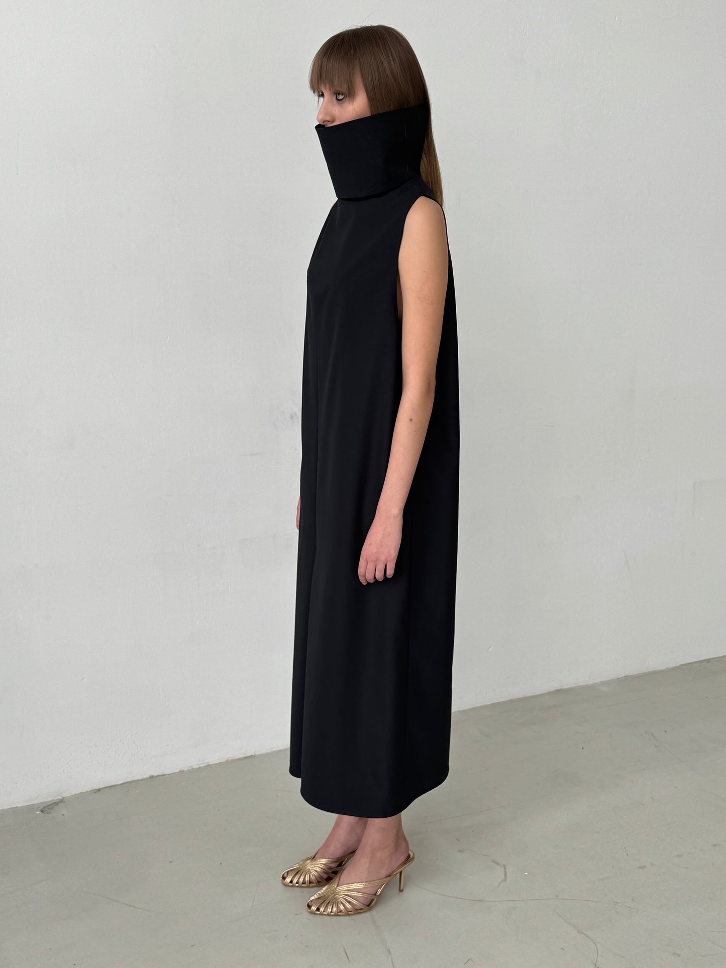 Black Dress with inverted front and back pleats
